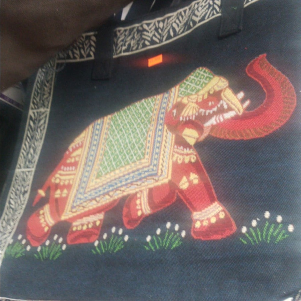 Red Elephant with Trunk up and Right foot out